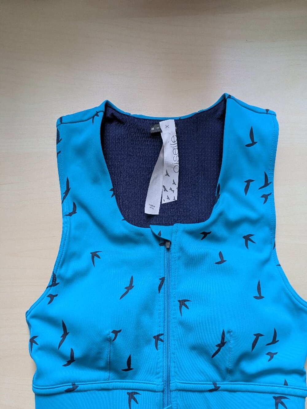 oiselle Turquoise Blue Zip-Front Sports Bra with Black Bird Print